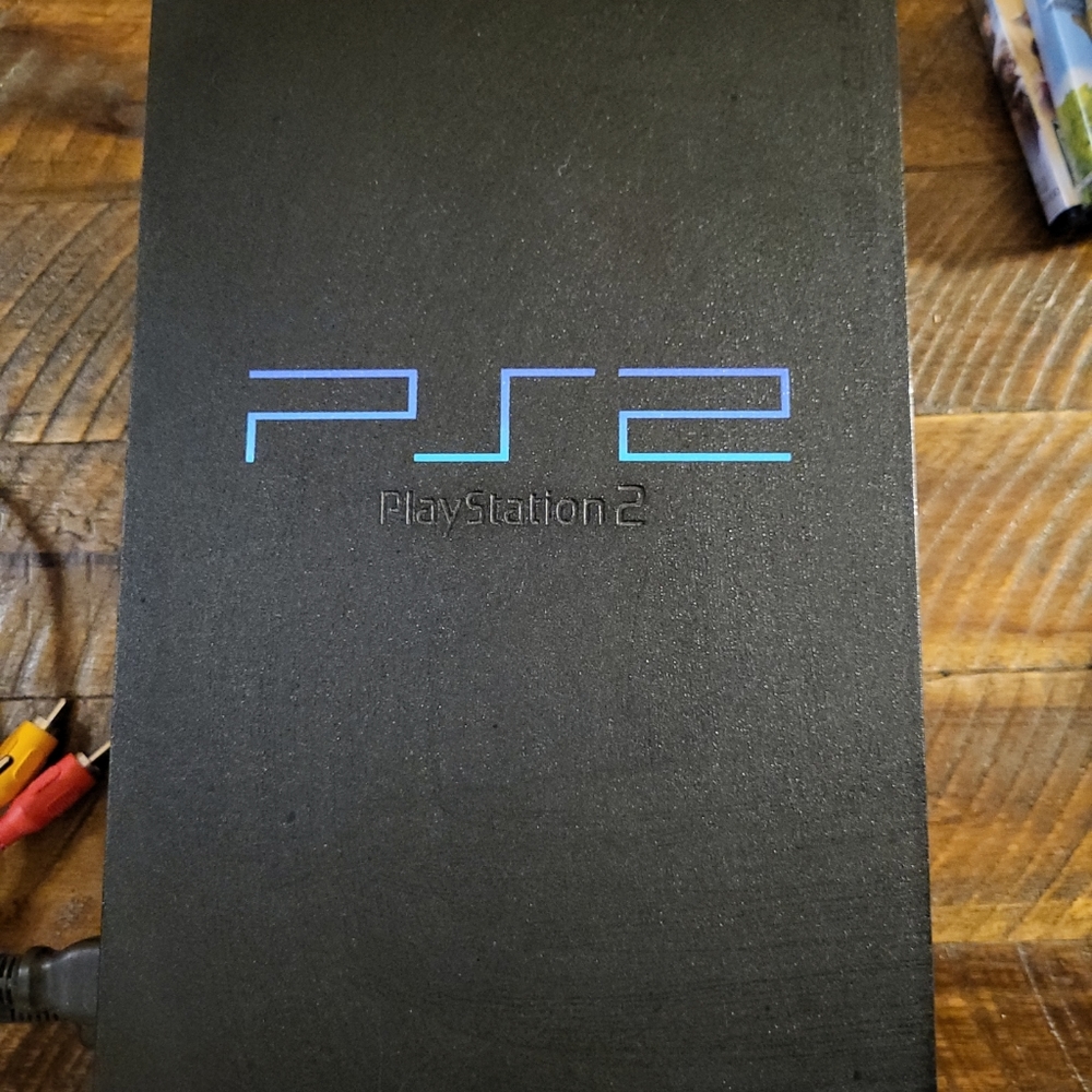 Playstation 2 console and 3 bonus games